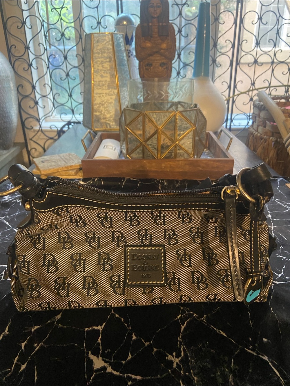 Dooney & Bourke Black and Tan Shoulder Bag with Gold-Tone Hardware